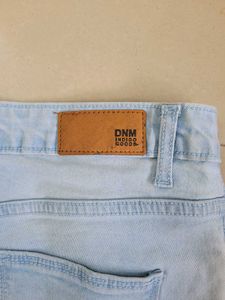 Ripped Light Wash Blue Jeans
