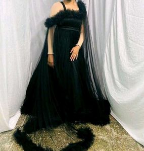Elegant Black Gown with Cape