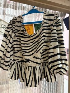 peplum top with puff sleeve