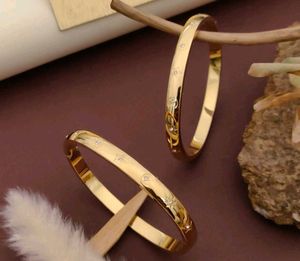 Gold Tone Flower Bangle Set