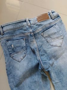 Light Wash Distressed Skinny Jean