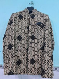 Elegant golden coat and black pant