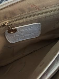 Elegant Off-White Clutch