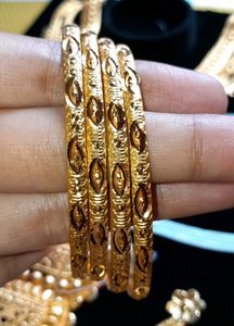 3 Gold Jewellery Sets With 4 Free Bangles