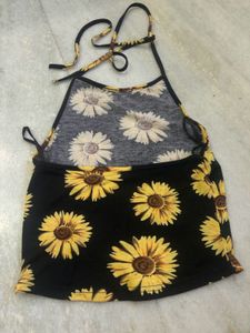 halter neck crop top featuring a vibrant sunflower
