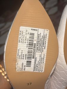 Iconic White Ballerinas