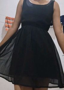 a black mini dress
