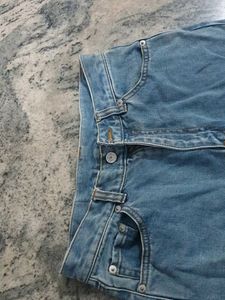 Boot-cut Light Blue Jeans.
