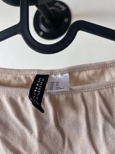 Beige gathered cap-sleeved top