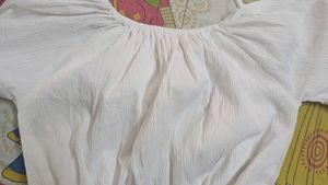 White flare beach vibe gown