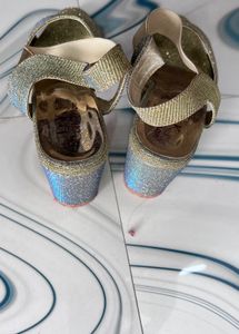 Gold Heels never used new