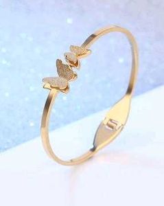 Golden Twin Butterfly Cuff Bracelet