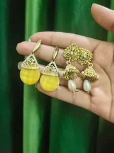 White Earrings Amd Golden Jhumkas.