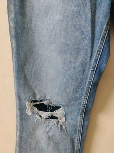 Ripped Blue Denim Jeans