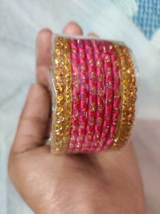 Title: Elegant Pink and Gold Bangles – Size 2-4