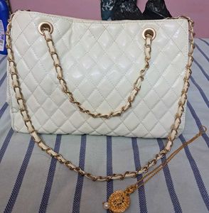 Elegant White Handbag with gold plated locket