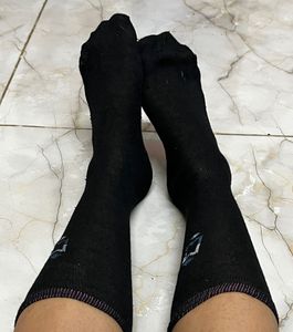 1pair Of Worn Black Socks
