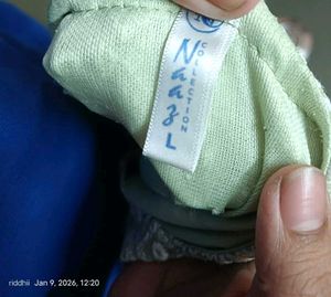 Embroidered Peplum Top