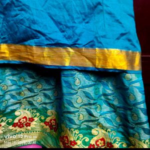 Teal Silk Blouse And Long Skirt( Pattupavada)