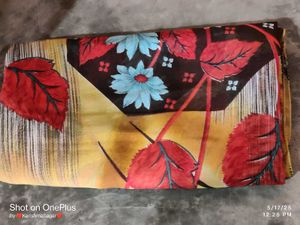 Saree With Sleeveless Blouse