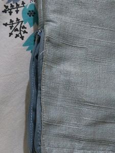 A beautiful grey lehenga with pink detailing