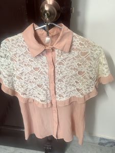 It’s Peach Top With White Lace Detailing