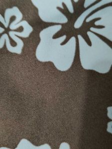 A beautiful brown miniskirt skirt with blue floral