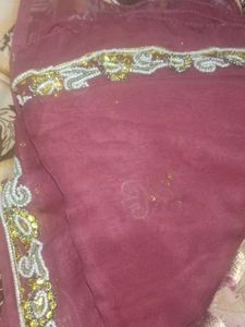 a rajasthani saree with work on it