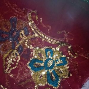 Embroidered Maroon net saree