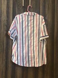 A white with colour striped shirt for women