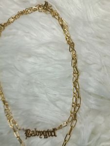 2 Layered golden pendant with butterfly charm