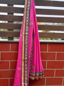 Rani Pink Saree With Embellished Border And Blouse