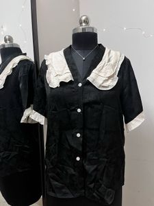 Black Shirt With White Lace Collar