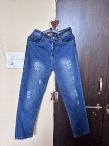 Ripped Blue Denim Jeans