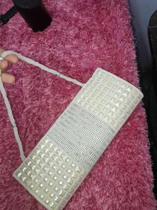 cream clutch bag