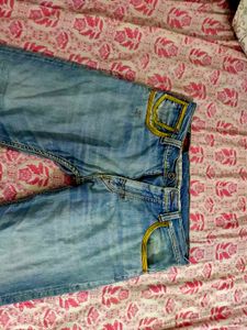 Distressed Denim Jeans