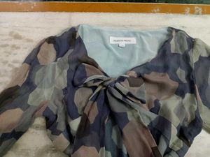 Stylish Top with Tie Detail.