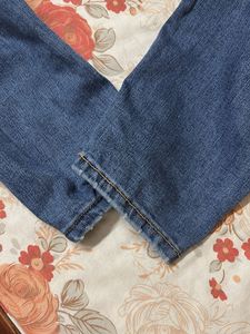 Ripped Knee Denim Jeans