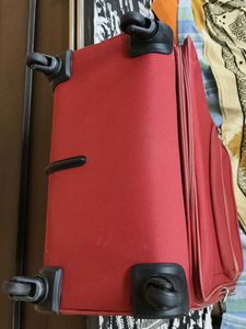American Tourister Red DC Superlight Trolley Bag