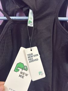 Newme Edgy Black Cutout Long Sleeve Top