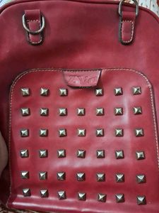 Red Studded Leather Handbag