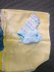 Yellow 🟡 White Netted Saree