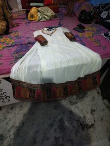 white gawn and colorfull duppata