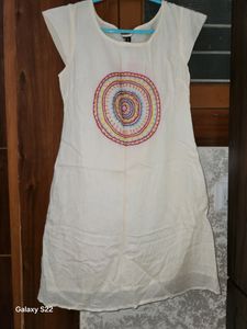 A Beautiful Cream Color Cotton Kurti