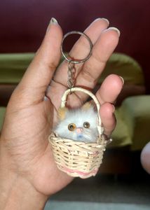 &#34;Fluffy Cat Keyring in Woven Basket&#34;