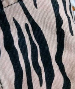 pinafore dress, featuring a zebra print 🦓🐅