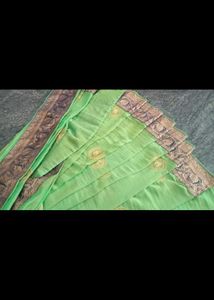 Eligent Green Saree With Peacock Pattern