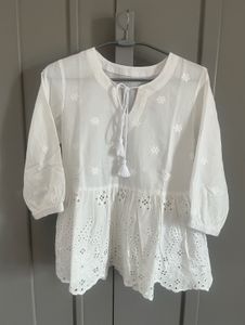 White Embroidered Peplum Top