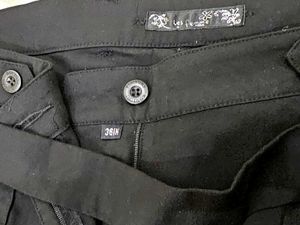 Black belted trousers
