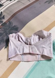 36X. OFF WHITE CORSET